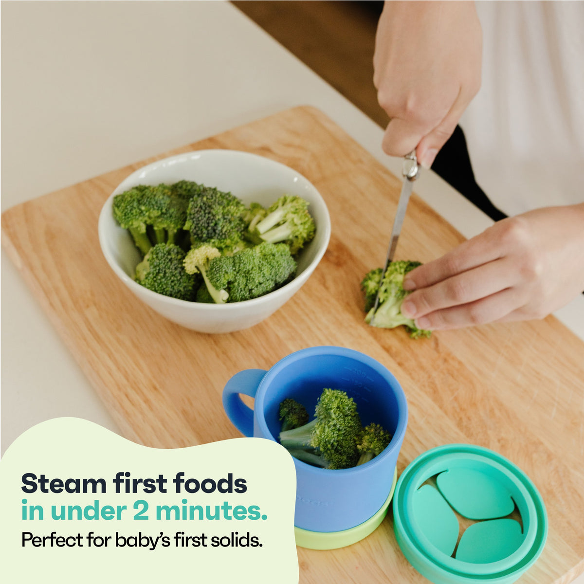 Steaming broccoli for first foods in the Morepeas cup with the snack lid