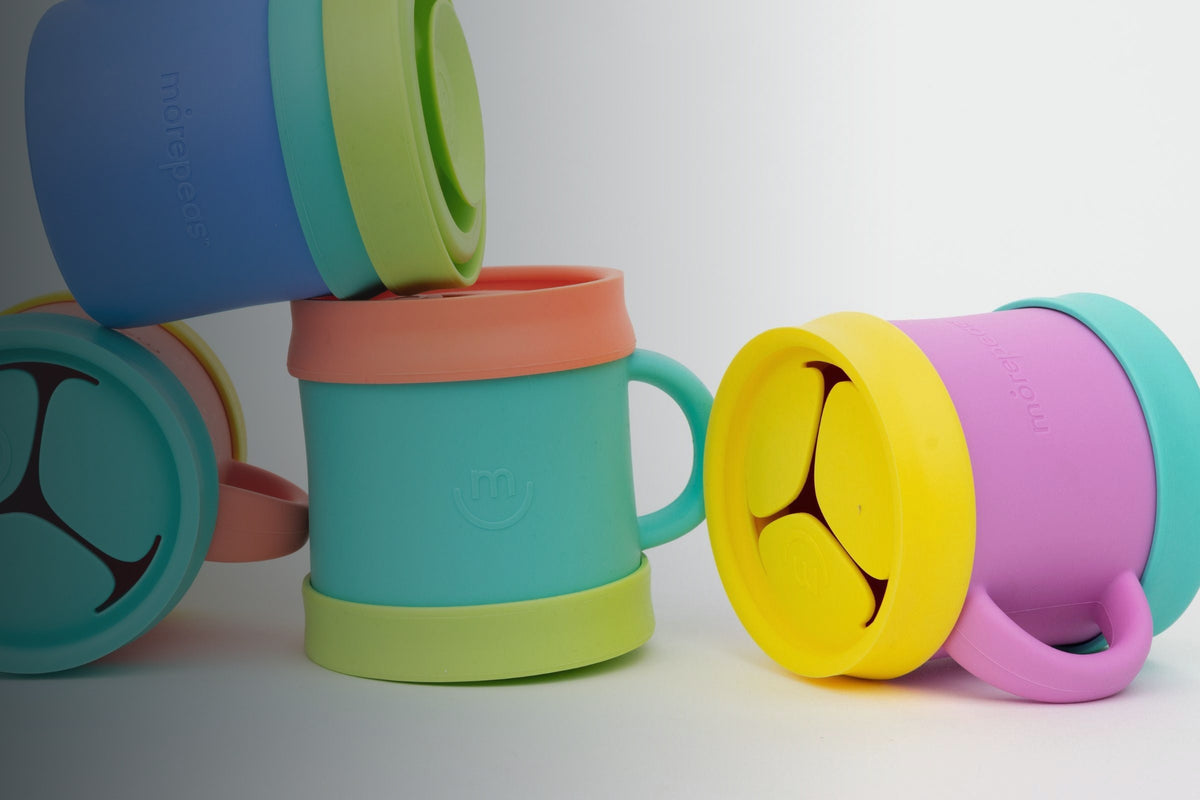 Morepeas Everything Snack Cups stacked in bright colors
