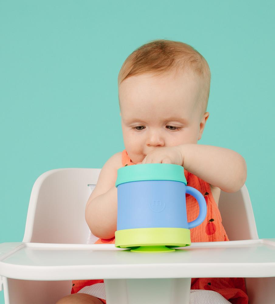 baby feeding with morepeas suctioned snack bowl