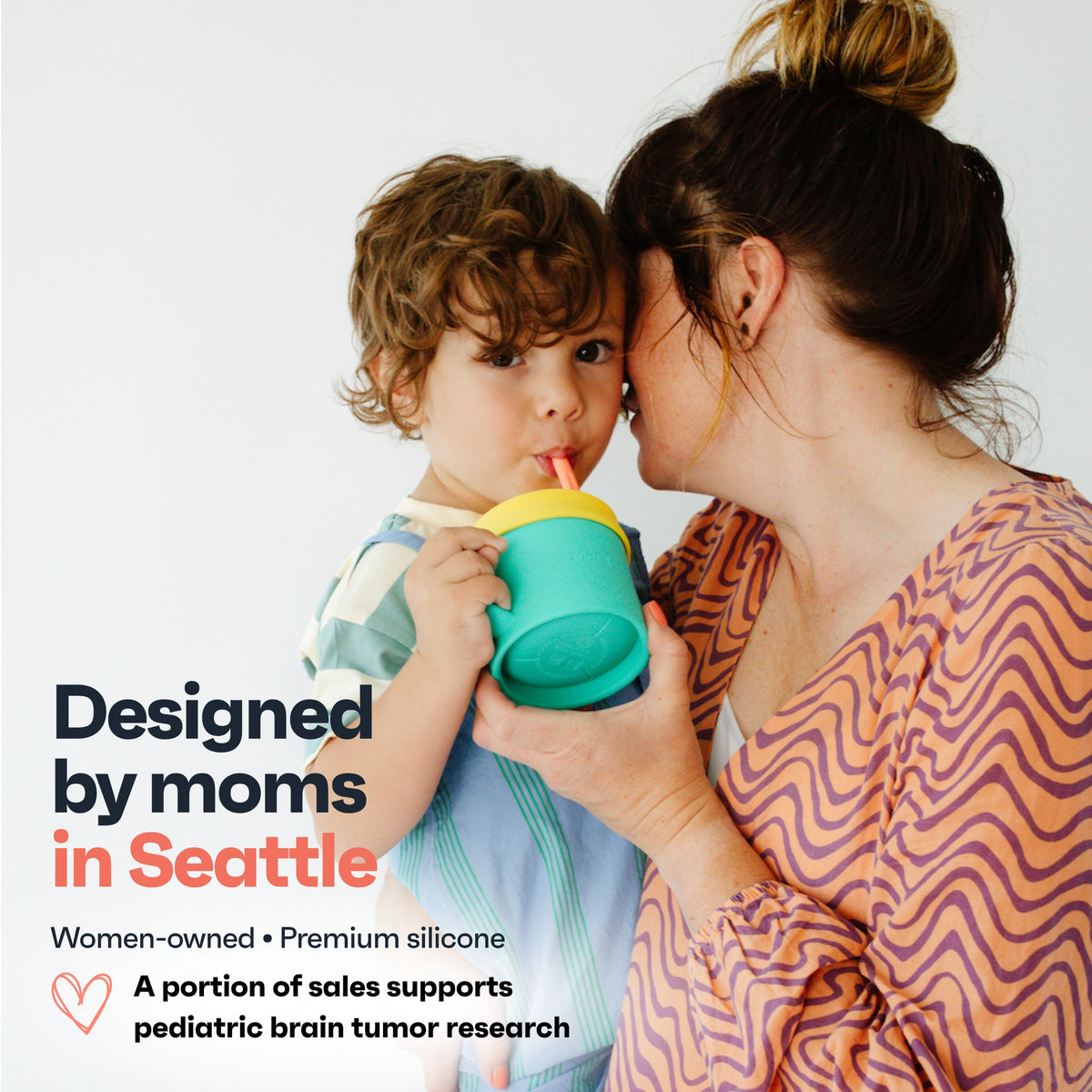 Mom and toddler with a Snack Stack straw cup, designed by moms in Seattle